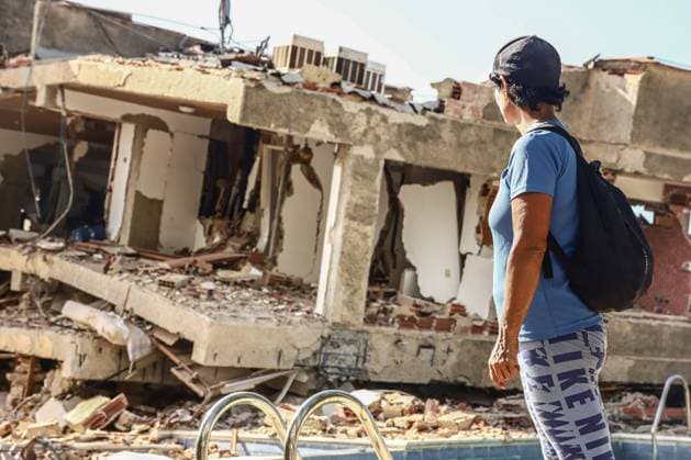 Aftermath of the Earthquake in Caraballeda, La Guaira, Venezuela CARABALLEDA, VENEZUELA JULY 7, 2026: Aura Milena Rodriguez stands among the ruins of her destroyed home in Caraballeda, La Guaira, as she searches for any trace of her son, JosÃ Miguel Gonzalez Rodriguez, 25, a Spanish citizen who has been missing since the powerful earthquakes struck Venezuela on June 24. Accompanied by rescue teams, Rodriguez returned to the collapsed building where her son was last seen, clinging to hope as search and recovery operations continue. Spanish authorities have confirmed the deaths of 35 Spanish citizens, while 140 others remain missing, including JosÃ Miguel. The earthquakes have killed at least 3,685 people, displaced nearly 18,000 re Copyright: x xLauraxdexChiclanax xJNAxPressx