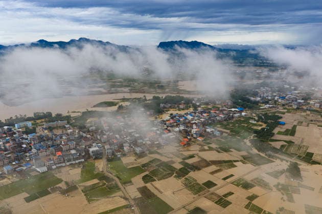 NANNING, CHINA - JULY 07: Floodwaters submerge fields of Linjiang village on July 7, 2026 in Hengzhou, Nanning, Guangxi Zhuang Autonomous Region of China. Recent extreme rainstorms triggered by Typhoon Maysak, the 10th typhoon of the year, have caused severe flooding in parts of south China s Guangxi Zhuang Autonomous Region.  Copyright: xVCGx 111652981419