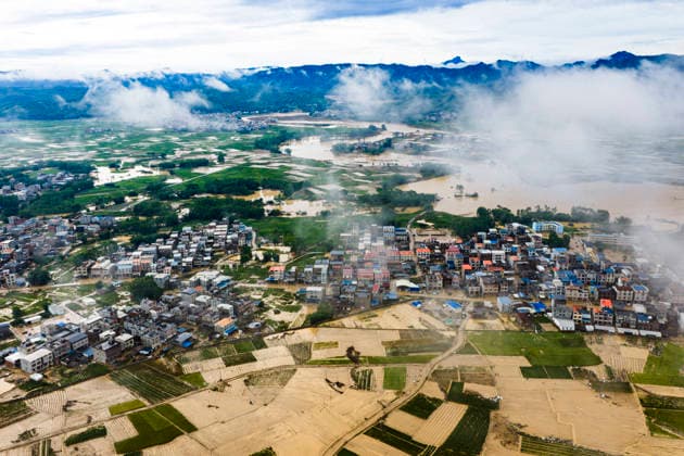 NANNING, CHINA - JULY 07: Floodwaters submerge fields of Linjiang village on July 7, 2026 in Hengzhou, Nanning, Guangxi Zhuang Autonomous Region of China. Recent extreme rainstorms triggered by Typhoon Maysak, the 10th typhoon of the year, have caused severe flooding in parts of south China s Guangxi Zhuang Autonomous Region.  Copyright: xVCGx 111652981421