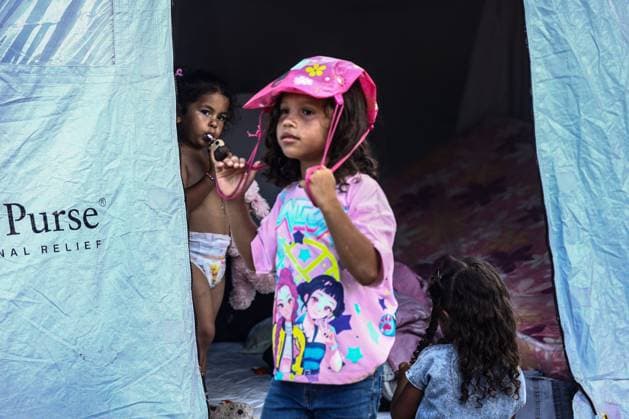Aftermath of the Earthquake in Caraballeda, La Guaira, Venezuela CARABALLEDA, LA GUAIRA, VENEZUELA JULY 7, 2026: Displaced families shelter in temporary camps following the devastating earthquakes that struck Venezuela s Caribbean coast. Thousands of residents remain without permanent housing as humanitarian organizations provide emergency assistance, while rescue and recovery operations continue across the hardest-hit communities in La Guaira state. Authorities say the earthquakes have killed at least 3,685 people, injured more than 16,700, left thousands missing, and displaced nearly 18,000 residents. CARABALLEDA Venezuela (Bolivarian Republic of) Copyright: x xLauraxdexChiclanax xJNAxPressx