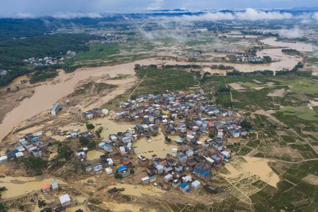 NANNING, CHINA - JULY 07: Floodwaters submerge Liulan village on July 7, 2026 in Hengzhou, Nanning, Guangxi Zhuang Autonomous Region of China. Recent extreme rainstorms triggered by Typhoon Maysak, the 10th typhoon of the year, have caused severe flooding in parts of south China s Guangxi Zhuang Autonomous Region.  Copyright: xVCGx 111652981425