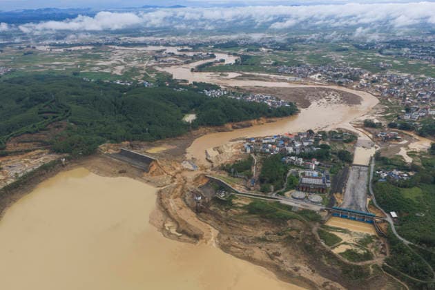 NANNING, CHINA - JULY 07: Floodwaters submerge Liulan reservoir on July 7, 2026 in Hengzhou, Nanning, Guangxi Zhuang Autonomous Region of China. Recent extreme rainstorms triggered by Typhoon Maysak, the 10th typhoon of the year, have caused severe flooding in parts of south China s Guangxi Zhuang Autonomous Region.  Copyright: xVCGx 111652981429