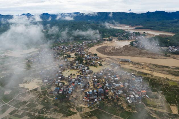NANNING, CHINA - JULY 07: Floodwaters submerge Liulan village on July 7, 2026 in Hengzhou, Nanning, Guangxi Zhuang Autonomous Region of China. Recent extreme rainstorms triggered by Typhoon Maysak, the 10th typhoon of the year, have caused severe flooding in parts of south China s Guangxi Zhuang Autonomous Region.  Copyright: xVCGx 111652981434