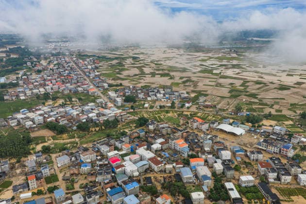 NANNING, CHINA - JULY 07: Floodwaters submerge Liulan village on July 7, 2026 in Hengzhou, Nanning, Guangxi Zhuang Autonomous Region of China. Recent extreme rainstorms triggered by Typhoon Maysak, the 10th typhoon of the year, have caused severe flooding in parts of south China s Guangxi Zhuang Autonomous Region.  Copyright: xVCGx 111652981435