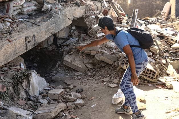 Aftermath of the Earthquake in Caraballeda, La Guaira, Venezuela CARABALLEDA, VENEZUELA JULY 7, 2026: Aura Milena Rodriguez stands among the ruins of her destroyed home in Caraballeda, La Guaira, as she searches for any trace of her son, JosÃ Miguel Gonzalez Rodriguez, 25, a Spanish citizen who has been missing since the powerful earthquakes struck Venezuela on June 24. Accompanied by rescue teams, Rodriguez returned to the collapsed building where her son was last seen, clinging to hope as search and recovery operations continue. Spanish authorities have confirmed the deaths of 35 Spanish citizens, while 140 others remain missing, including JosÃ Miguel. The earthquakes have killed at least 3,685 people, displaced nearly 18,000 re Copyright: x xLauraxdexChiclanax xJNAxPressx