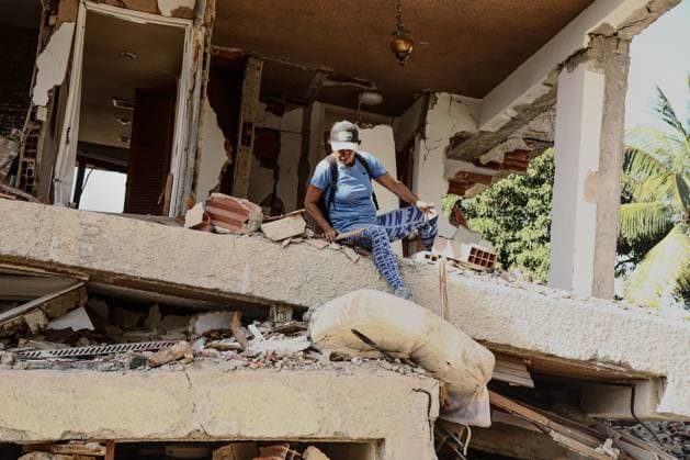 Aftermath of the Earthquake in Caraballeda, La Guaira, Venezuela CARABALLEDA, VENEZUELA JULY 7, 2026: Aura Milena Rodriguez stands among the ruins of her destroyed home in Caraballeda, La Guaira, as she searches for any trace of her son, JosÃ Miguel Gonzalez Rodriguez, 25, a Spanish citizen who has been missing since the powerful earthquakes struck Venezuela on June 24. Accompanied by rescue teams, Rodriguez returned to the collapsed building where her son was last seen, clinging to hope as search and recovery operations continue. Spanish authorities have confirmed the deaths of 35 Spanish citizens, while 140 others remain missing, including JosÃ Miguel. The earthquakes have killed at least 3,685 people, displaced nearly 18,000 re Copyright: x xLauraxdexChiclanax xJNAxPressx