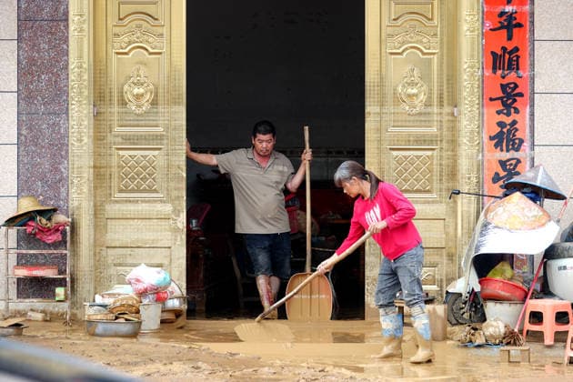 NANNING, CHINA - JULY 07: Villagers clear mud and silt from their house on July 7, 2026 in Hengzhou, Nanning, Guangxi Zhuang Autonomous Region of China. Recent extreme rainstorms triggered by Typhoon Maysak, the 10th typhoon of the year, have caused severe flooding in parts of south China s Guangxi Zhuang Autonomous Region.  Copyright: xVCGx 111652981457