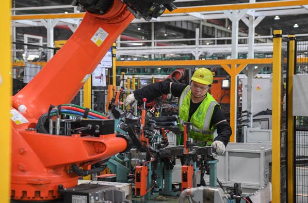 JINHUA, CHINA - JULY 07: Industrial robots process new energy vehicle parts at the intelligent production workshop of Zhejiang Zhixin Technology Co., Ltd. on July 7, 2026 in Jinhua, Zhejiang Province of China. The workshop is dedicated to the production of components for new energy vehicles.  Copyright: xVCGx 111652845294