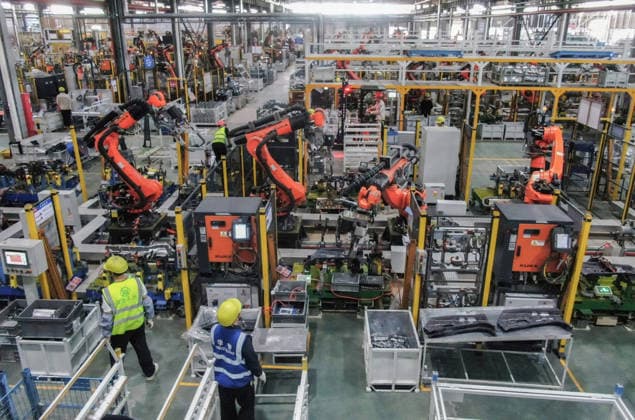 JINHUA, CHINA - JULY 07: Industrial robots process new energy vehicle parts at the intelligent production workshop of Zhejiang Zhixin Technology Co., Ltd. on July 7, 2026 in Jinhua, Zhejiang Province of China. The workshop is dedicated to the production of components for new energy vehicles.  Copyright: xVCGx 111652845289