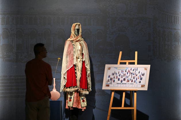 TAIYUAN, CHINA - JULY 08: Visitors view traditional Armenian costumes from the 19th century at the Shanxi Museum on July 8, 2026 in Taiyuan, Shanxi Province of China. The exhibition Land of Noah: Masterpieces from the History Museum of Yerevan, Armenia features 134 sets of artifacts including silverware, musical instruments, carpets, embroidery, oil paintings and pottery.  Copyright: xChinaxNewsxServicex 111653053321