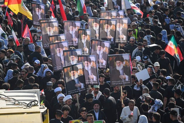 Thousands gather in Iraq for funeral procession of slain Iranian leader Khamenei NAJAF, IRAQ - JULY 8: A massive crowd of mourners carrying various flags and posters fills the streets during a farewell ceremony for slain Iranian supreme leader Ali Khamenei, in Najaf, Iraq, on July 8, 2026. Khamenei lost his life following joint US-Israeli attacks. Starting from the early hours of the morning, thousands of people flooded the squares and avenues to take part in the funeral procession and pay their final respects. Haidar Mohammed Ali Anadolu Najaf Iraq. Editorial use only. Please get in touch for any other usage.  Copyright: x2026xAnadoluxHaidarxMohammedxAlix