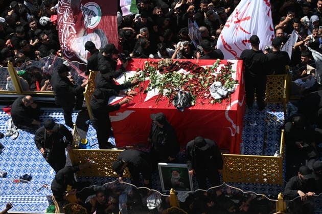 Thousands gather in Iraq for funeral procession of slain Iranian leader Khamenei NAJAF, IRAQ - JULY 8: A massive crowd of mourners carrying flags and posters fills the streets as the coffins of Iranian supreme leader Ali Khamenei and his family members are carried among the public inside a specially designed truck resembling the Imam Reza Shrine during a farewell ceremony in Najaf, Iraq, on July 8, 2026. Khamenei lost his life following joint US-Israeli attacks, drawing thousands to the squares and avenues since the early hours of the morning. Haidar Mohammed Ali Anadolu Najaf Iraq. Editorial use only. Please get in touch for any other usage.  Copyright: x2026xAnadoluxHaidarxMohammedxAlix
