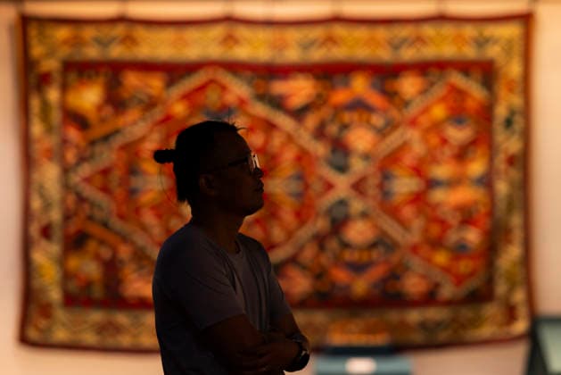 TAIYUAN, CHINA - JULY 08: Visitors view artifacts during the exhibition Land of Noah: Masterpieces from the Yerevan History Museum of Armenia at the Shanxi Museum on July 8, 2026 in Taiyuan, Shanxi Province of China. The exhibition features 134 sets of precious artifacts including traditional costumes, silverware, musical instruments, carpets, embroidery, oil paintings and pottery.  Copyright: xVCGx 111653071831