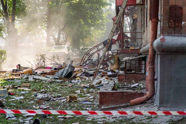 Russian rocket strikes target civilian infrastructure and residential areas in Kharkiv KHARKIV, UKRAINE - JULY 08: A view of the area as emergency responders work at the scene after Russian forces launched a morning missile strike that partially destroyed a five-story residential building, killing at least two people and injuring over 20 others, in the Nemyshlianskyi district of Kharkiv, Ukraine on July 08, 2026. Carlo Bravo Anadolu Kharkiv Ukraine. Editorial use only. Please get in touch for any other usage.  Copyright: x2026xAnadoluxCarloxBravox