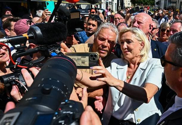 RN Campaign Trip PHOTOPQR OUEST FRANCE Franck Dubray La Flèche July 8, 2026 First campaign trip for Marine Le Pen, National Rally (RN) candidate for the 2027 presidential election, and Jordan Bardella at the La Flèche market in La Flèche, France – July 8, 2026 Marine Le Pen, National Rally (RN) candidate for the 2027 French presidential election, and Jordan Bardella during their first campaign visit to the La Flèche market in La Flèche, France  Copyright: xPHOTOPQR OUESTxFRANCE MAXPPPxFranckxDubrayx 20260708OFR0614 20260708OFR0611