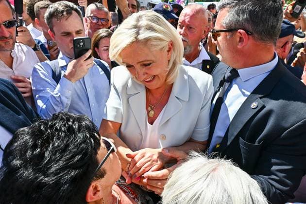 RN Campaign Trip PHOTOPQR OUEST FRANCE Franck Dubray La Flèche July 8, 2026 First campaign trip for Marine Le Pen, National Rally (RN) candidate for the 2027 presidential election, and Jordan Bardella at the La Flèche market in La Flèche, France – July 8, 2026 Marine Le Pen, National Rally (RN) candidate for the 2027 French presidential election, and Jordan Bardella during their first campaign visit to the La Flèche market in La Flèche, France  Copyright: xPHOTOPQR OUESTxFRANCE MAXPPPxFranckxDubrayx 20260708OFR0614 20260708OFR0616