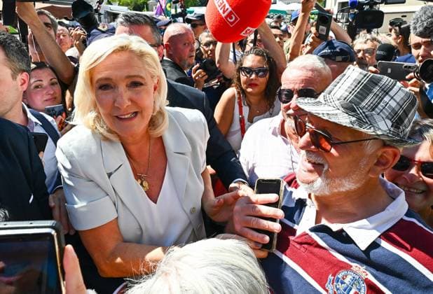 RN Campaign Trip PHOTOPQR OUEST FRANCE Franck Dubray La Flèche July 8, 2026 First campaign trip for Marine Le Pen, National Rally (RN) candidate for the 2027 presidential election, and Jordan Bardella at the La Flèche market in La Flèche, France – July 8, 2026 Marine Le Pen, National Rally (RN) candidate for the 2027 French presidential election, and Jordan Bardella during their first campaign visit to the La Flèche market in La Flèche, France  Copyright: xPHOTOPQR OUESTxFRANCE MAXPPPxFranckxDubrayx 20260708OFR0614 20260708OFR0619