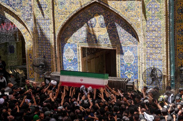 Farewell ceremony held for Iran s former leader Ali Khamenei in Najaf NAJAF, IRAQ - JULY 8: Large crowds carrying flags and posters attend the farewell ceremony held for former Iranian leader Ali Khamenei, who was killed in U.S.-Israeli attacks as in Najaf, Iran on July 8, 2026. The coffins of Khamenei and his family members are transported through the crowd in a specially designed truck after the Imam Reza Shrine before being brought to the Imam Ali Shrine. Karar Essa Anadolu Najaf Iraq. Editorial use only. Please get in touch for any other usage.  Copyright: x2026xAnadoluxKararxEssax
