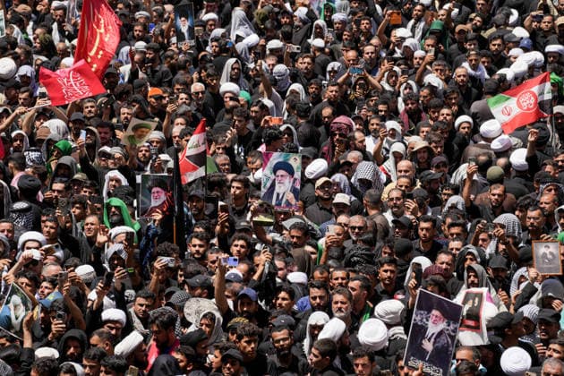 Farewell ceremony held for Iran s former leader Ali Khamenei in Najaf NAJAF, IRAQ - JULY 8: Large crowds carrying flags and posters attend the farewell ceremony held for former Iranian leader Ali Khamenei, who was killed in U.S.-Israeli attacks as in Najaf, Iran on July 8, 2026. The coffins of Khamenei and his family members are transported through the crowd in a specially designed truck after the Imam Reza Shrine before being brought to the Imam Ali Shrine. Karar Essa Anadolu Najaf Iraq. Editorial use only. Please get in touch for any other usage.  Copyright: x2026xAnadoluxKararxEssax