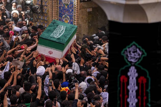 Farewell ceremony held for Iran s former leader Ali Khamenei in Najaf NAJAF, IRAQ - JULY 8: Large crowds carrying flags and posters attend the farewell ceremony held for former Iranian leader Ali Khamenei, who was killed in U.S.-Israeli attacks as in Najaf, Iran on July 8, 2026. The coffins of Khamenei and his family members are transported through the crowd in a specially designed truck after the Imam Reza Shrine before being brought to the Imam Ali Shrine. Karar Essa Anadolu Najaf Iraq. Editorial use only. Please get in touch for any other usage.  Copyright: x2026xAnadoluxKararxEssax