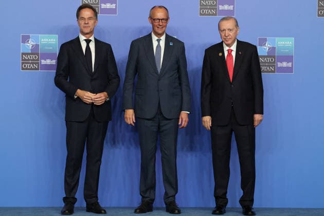 NATO Leaders Summit - Ankara NATO Secretary General Mark Rutte (L) and Turkey s President Recep Tayyip Erdogan (R) greet Germanyís Chancellor Friedrich Merz as he arrives for a NATO Summit at Bestepe Presidential Compound in Ankara, Turkey, July 8, 2026. The summit comes at a fraught time for the 77-year-old transatlantic alliance, with the US President demanding members make good on a pledge to ramp up defence spending as Washington takes a step back from Europe. Photo by Ludovic Marin Pool ABACAPRESS.COM Ankara Turkey  Copyright: xMarinxLudovic Pool ABACAx