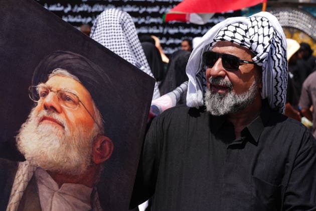Farewell ceremony for Iran s former leader Khamenei in Karbala KARBALA, IRAQ - JULY 08: Thousands of people carrying posters of Iran s former Supreme Leader Ali Khamenei and flags gather near the Imam Hussein Shrine in Karbala, Iraq, to attend the farewell ceremony for Khamenei, who was killed in the U.S.-Israeli attacks, on July 8, 2026. Murtadha Al-Sudani Anadolu Karbala Iraq. Editorial use only. Please get in touch for any other usage.  Copyright: x2026xAnadoluxMurtadhaxAl-Sudanix