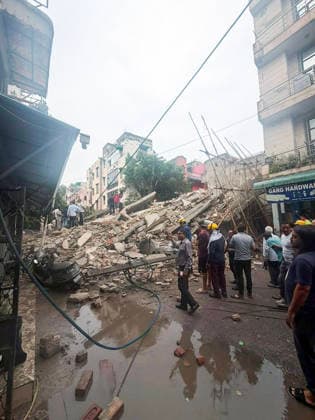 RECORD DATE NOT STATED Under-Construction Building Collapses in New Delhi s Rohini Sector 16 New Delhi, Jul 08 (ANI): Piles of rubble present after an under-construction building collapses at Rohini s Sector 16, in New Delhi on Wednesday. Firefighting and rescue operations underway. NEW DELHI Delhi India Copyright: xANIx ANI_20260708354
