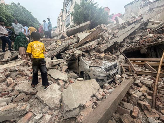 Under-Construction Building Collapses in New Delhi s Rohini Sector 16 New Delhi, Jul 08 (ANI): A view of a damaged vehicle trapped under the piles of rubble after an under-construction building collapsed at Rohini s Sector 16, in New Delhi on Wednesday. Firefighting and rescue operations underway. NEW DELHI Delhi India Copyright: xANIx ANI_20260708365