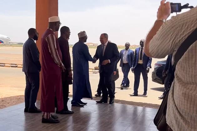 NIGER, NIAMEY - JULY 8, 2026: Seen in this video screen grab is Russia s Minister of Foreign Affairs Sergei Lavrov (C) greeting Nigerien officials at an airport during a working visit to Niger. Video grab. Best possible quality. Artyom Popov TASS  94829052