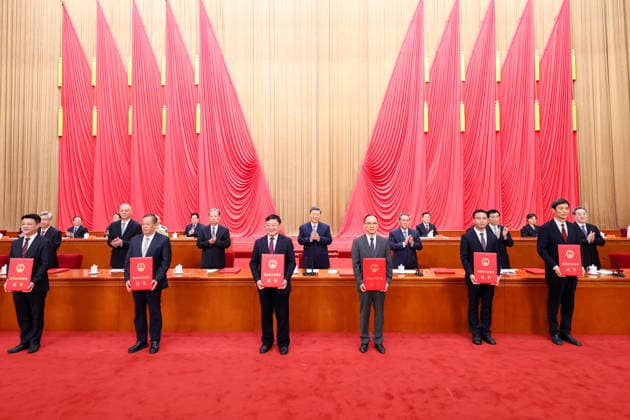 (260708) -- BEIJING, July 8, 2026 -- Xi Jinping and other leaders of the Communist Party of China and the state, together with the two winners of the national top sci-tech award, present certificates to representatives of recipients of the State Natural Science Award, the State Technological Invention Award, the State Scientific and Technological Progress Award and the China International Science and Technology Cooperation Award at the Great Hall of the People in Beijing, capital of China, July 8, 2026. A meeting bringing together the national science and technology award conference, the general assemblies of the members of the Chinese Academy of Sciences (CAS) and the Chinese Academy of Engineering (CAE), and the 11th national congress of 