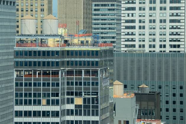 July 8, 2026, New York, New York, USA: View of the top floors of the commercial building in Midtown Manhattan of New York, NY on July 8, 2026 which was under construction to be converted as residential where on July 7 reported that a steel beam on the 21st floor was compromised, and the Fire Department said that two support columns inside the building were buckling and several upper floors were sagging. The building remains at risk of collapse and engineers are working to secure it. New York USA  - ZUMAr339 20260708_znp_r339_011 Copyright: xLevxRadinx