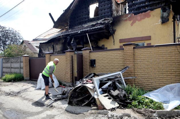 RECORD DATE NOT STATED A man clears debris and building rubble following the overnight Russian attack of July 6, Vyshneve, Kyiv region, Ukraine, on July 7, 2026. Russian forces launched a massive attack on Kyiv and the surrounding region using various types of missiles and attack drones. According to the State Emergency Service of Ukraine, seven people were killed in Vyshneve. Residential development on five streets was completely destroyed, while warehouses and businesses sustained damage. More than 600 local residents were evacuated because of the risk posed by unexploded ordnance (Photo by Volodymyr Tarasov Ukrinform) Aftermath of Russian attack and secondary explosions cleared in Vyshneve  Copyright: xVolodymyrxTarasovx