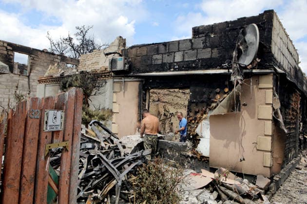 RECORD DATE NOT STATED Men work inside a private house destroyed by the overnight Russian attack of July 6, Vyshneve, Kyiv region, Ukraine, on July 7, 2026. Russian forces launched a massive attack on Kyiv and the surrounding region using various types of missiles and attack drones. According to the State Emergency Service of Ukraine, seven people were killed in Vyshneve. Residential development on five streets was completely destroyed, while warehouses and businesses sustained damage. More than 600 local residents were evacuated because of the risk posed by unexploded ordnance (Photo by Volodymyr Tarasov Ukrinform) Aftermath of Russian attack and secondary explosions cleared in Vyshneve  Copyright: xVolodymyrxTarasovx