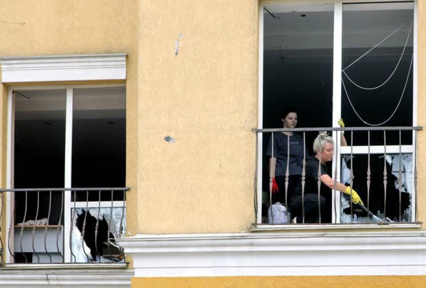RECORD DATE NOT STATED Girls clear shattered glass from a windowsill in a house damaged by the overnight Russian attack of July 6, Vyshneve, Kyiv region, Ukraine, on July 7, 2026. Russian forces launched a massive attack on Kyiv and the surrounding region using various types of missiles and attack drones. According to the State Emergency Service of Ukraine, seven people were killed in Vyshneve. Residential development on five streets was completely destroyed, while warehouses and businesses sustained damage. More than 600 local residents were evacuated because of the risk posed by unexploded ordnance (Photo by Volodymyr Tarasov Ukrinform) Aftermath of Russian attack and secondary explosions cleared in Vyshneve  Copyright: xVolodymyrxTarasovx
