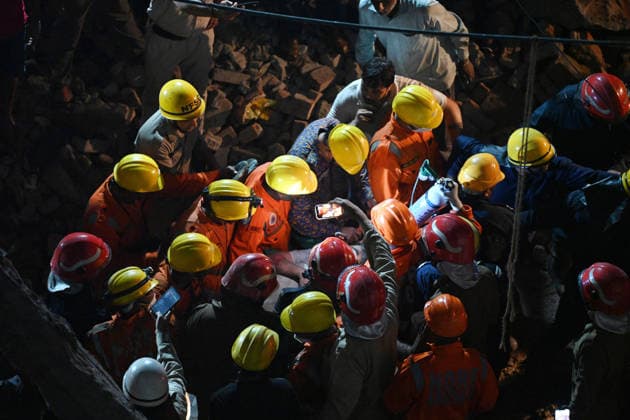 Rescue and relief operations underway after a building collapsed at the Rohini Sector 16 area New Delhi, Jul 08 (ANI): NDRF personnel rescue a survivor trapped under the debris after a building collapsed at the Rohini Sector 16 area, in New Delhi on Wednesday. New Delhi Delhi India Copyright: xANIx ANI_20260708555