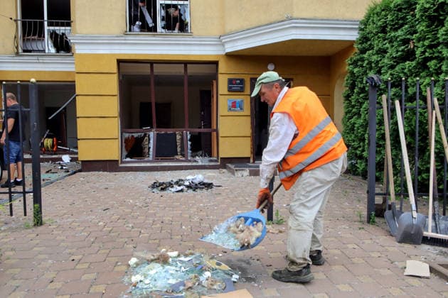 RECORD DATE NOT STATED Aftermath Of Russian Attack In Vyshneve - Ukraine A man clears broken glass from the grounds of a house damaged by a Russian attack in Vyshneve, Kyiv region, Ukraine, on July 7, 2026. During the night of July 6, Russian forces launched a massive attack on Kyiv and the surrounding region using various types of missiles and attack drones. According to the State Emergency Service of Ukraine, seven people were killed in Vyshneve. Residential development on five streets was completely destroyed, while warehouses and businesses sustained damage. More than 600 local residents were evacuated because of the risk posed by unexploded ordnance Photo by Volodymyr Tarasov Ukrinform ABACAPRESS.COM Kyiv region Ukraine  Copyright: xTarasovxVolodymyr Ukrinform ABACAx