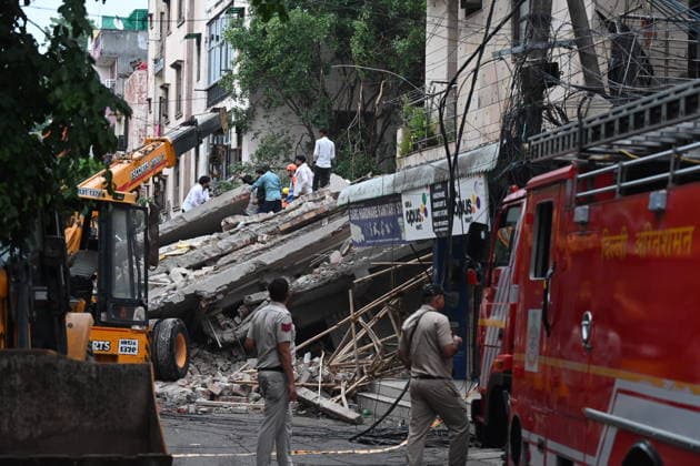 NEW DELHI, INDIA - JULY 8: A four-storey building collapsed in north west Delhi s Rohini Sector 16 on Wednesday evening amid rainfall, triggering a major rescue operation as several people are feared trapped beneath the debris on July 8, 2026 in New Delhi, India. (Photo by Ishant Chauhan Hindustan Times) Man Killed As Under-Construction Building Collapses In Delhi s Rohini Sector 16