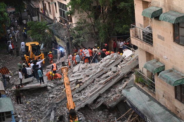 NEW DELHI, INDIA - JULY 8: NDRF personnel rescue a survivor trapped under the debris after a building collapsed in G Block, Sector 16, Rohini on July 8, 2026 in New Delhi, India. Rescue operations were launched immediately, with multiple emergency agencies deployed to search for and evacuate those trapped beneath the rubble. (Photo by Ishant Chauhan Hindustan Times) Man Killed As Under-Construction Building Collapses In Delhi s Rohini Sector 16