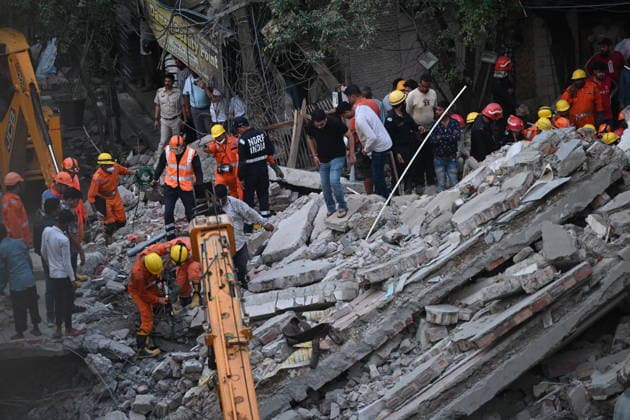 NEW DELHI, INDIA - JULY 8: NDRF personnel rescue a survivor trapped under the debris after a building collapsed in G Block, Sector 16, Rohini on July 8, 2026 in New Delhi, India. Rescue operations were launched immediately, with multiple emergency agencies deployed to search for and evacuate those trapped beneath the rubble. (Photo by Ishant Chauhan Hindustan Times) Man Killed As Under-Construction Building Collapses In Delhi s Rohini Sector 16