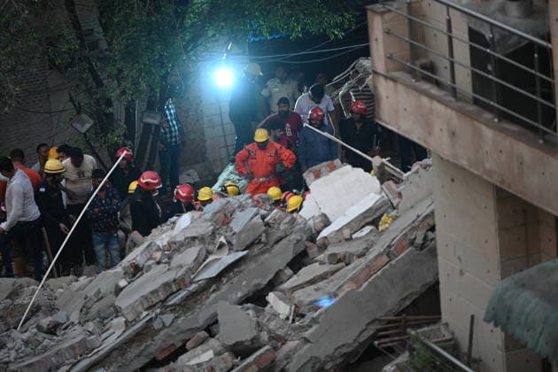 NEW DELHI, INDIA - JULY 8: NDRF personnel rescue a survivor trapped under the debris after a building collapsed in G Block, Sector 16, Rohini on July 8, 2026 in New Delhi, India. Rescue operations were launched immediately, with multiple emergency agencies deployed to search for and evacuate those trapped beneath the rubble. (Photo by Ishant Chauhan Hindustan Times) Man Killed As Under-Construction Building Collapses In Delhi s Rohini Sector 16