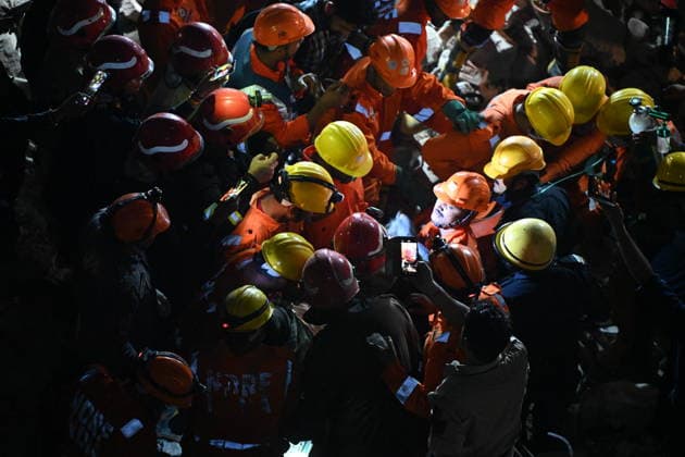 NEW DELHI, INDIA - JULY 8: NDRF personnel rescue a survivor trapped under the debris after a building collapsed in G Block, Sector 16, Rohini on July 8, 2026 in New Delhi, India. Rescue operations were launched immediately, with multiple emergency agencies deployed to search for and evacuate those trapped beneath the rubble. (Photo by Ishant Chauhan Hindustan Times) Man Killed As Under-Construction Building Collapses In Delhi s Rohini Sector 16