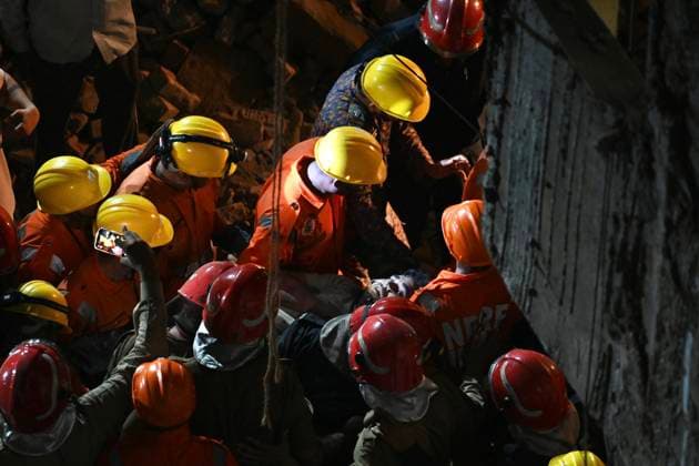 NEW DELHI, INDIA - JULY 8: NDRF personnel rescue a survivor trapped under the debris after a building collapsed in G Block, Sector 16, Rohini on July 8, 2026 in New Delhi, India. Rescue operations were launched immediately, with multiple emergency agencies deployed to search for and evacuate those trapped beneath the rubble. (Photo by Sanchit Khanna Hindustan Times) Man Killed As Under-Construction Building Collapses In Delhi s Rohini Sector 16