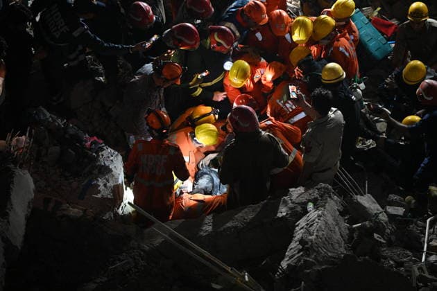 NEW DELHI, INDIA - JULY 8: NDRF personnel rescue a survivor trapped under the debris after a building collapsed in G Block, Sector 16, Rohini on July 8, 2026 in New Delhi, India. Rescue operations were launched immediately, with multiple emergency agencies deployed to search for and evacuate those trapped beneath the rubble. (Photo by Ishant Chauhan Hindustan Times) Man Killed As Under-Construction Building Collapses In Delhi s Rohini Sector 16