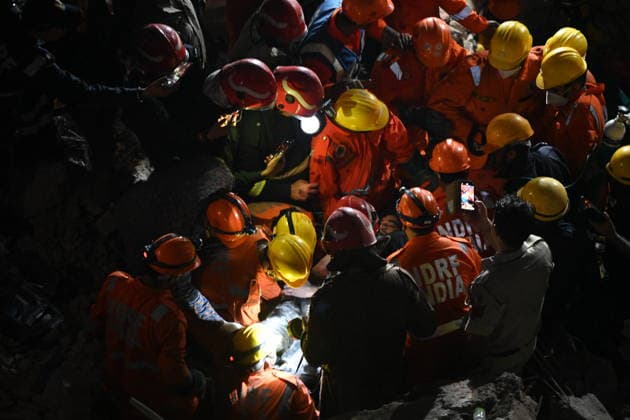 NEW DELHI, INDIA - JULY 8: NDRF personnel rescue a survivor trapped under the debris after a building collapsed in G Block, Sector 16, Rohini on July 8, 2026 in New Delhi, India. Rescue operations were launched immediately, with multiple emergency agencies deployed to search for and evacuate those trapped beneath the rubble. (Photo by Ishant Chauhan Hindustan Times) Man Killed As Under-Construction Building Collapses In Delhi s Rohini Sector 16