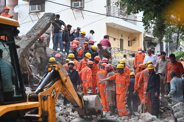 NEW DELHI, INDIA - JULY 8: National Disaster Response Force (NDRF) personnel carry out rescue operations after an under-construction building collapsed in G Block, Sector 16, Rohini on July 8, 2026 in New Delhi India. Multiple agencies, including Delhi Police and the fire department, launched a search-and-rescue operation amid fears that several people were trapped under the debris.(Photo by Sanchit Khanna Hindustan Times) Man Killed As Under-Construction Building Collapses In Delhi s Rohini Sector 16