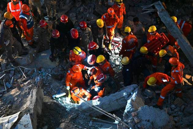 NEW DELHI, INDIA - JULY 8: NDRF personnel rescue a survivor trapped under the debris after a building collapsed in G Block, Sector 16, Rohini on July 8, 2026 in New Delhi, India. Rescue operations were launched immediately, with multiple emergency agencies deployed to search for and evacuate those trapped beneath the rubble. (Photo by Sanchit Khanna Hindustan Times) Man Killed As Under-Construction Building Collapses In Delhi s Rohini Sector 16