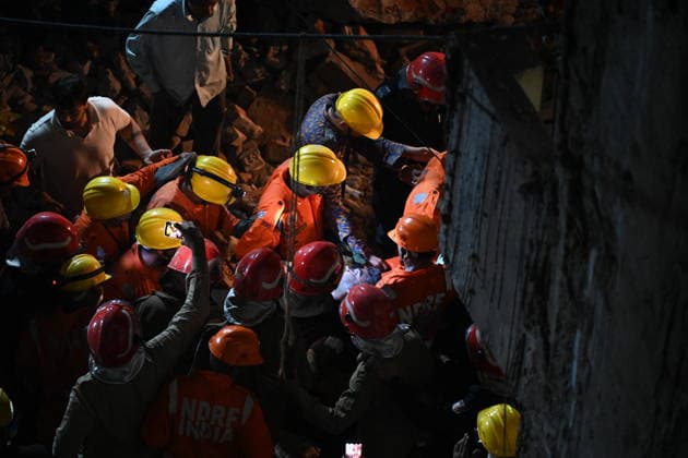 NEW DELHI, INDIA - JULY 8: NDRF personnel rescue a survivor trapped under the debris after a building collapsed in G Block, Sector 16, Rohini on July 8, 2026 in New Delhi, India. Rescue operations were launched immediately, with multiple emergency agencies deployed to search for and evacuate those trapped beneath the rubble. (Photo by Ishant Chauhan Hindustan Times) Man Killed As Under-Construction Building Collapses In Delhi s Rohini Sector 16