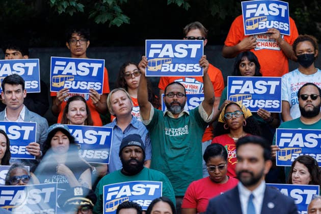 July 8, 2026, Brooklyn, New York, USA: Supporters are seen behind Mayor ZOHRAN MAMDANI during a press conference to unveil a bus action plan on Wednesday. Mayor Zohran Mamdani and Governor Kathy Hochul unveiled Ã¢â‚¬ËœNext Stop Fast Buses, Better Service,Ã¢â‚¬â ¢ aimed at making services faster and more accessible, and announced partnerships with the New York City Department of Transportation (NYC DOT) and the Metropolitan Transportation Authority Brooklyn USA  - ZUMAh182 20260708_znp_h182_020 Copyright: xMatthewxHoenx