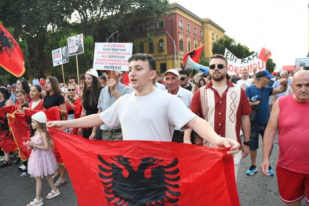 Protests continue in Albania against the planned tourism project in Zvernec TIRANA, ALBANIA - JULY 8: Demonstrators holding Albanian flag and posters gather at Skanderbeg Square during the 39th consecutive day of protests held under the slogan Albania is Not for Sale, opposing a planned tourism project in the Zvernec area of Vlore, in Tirana, Albania, on July 8, 2026. Olsi Shehu Anadolu Tirana Albania. Editorial use only. Please get in touch for any other usage.  Copyright: x2026xAnadoluxOlsixShehux