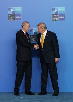 President Donald Trump, is greeted by Turkish President Recep Tayyip Erdogan as he arrives for the NATO summit in Ankara, Turkey, Wednesday, July 8, 2026.  TUR2026070851 TurkishxPresidencyxOffice